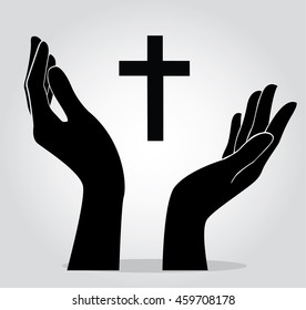 hands holding the cross