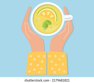 Hands holding a cup of green tea with lemon on top. The girl warms her hands. Fragrant drink, morning drink in warm hands. Time relax. Vector isolated flat design illustration. Flat lay.