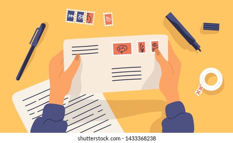 Hands holding envelope with stamps surrounded by stationery. Top view on table surface. Sending written letter or correspondence through postal service. Flat cartoon colorful vector illustration.