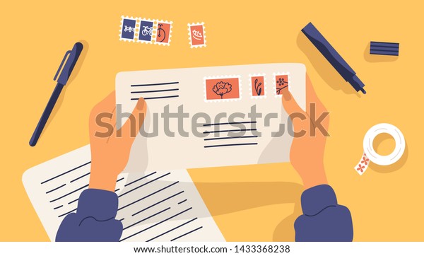 Hands holding envelope with stamps\
surrounded by stationery. Top view on table surface. Sending\
written letter or correspondence through postal service. Flat\
cartoon colorful vector\
illustration.