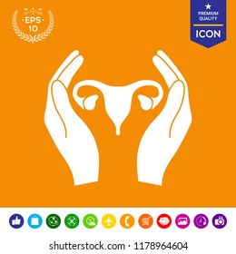 Hands holding Female uterus - protection icon