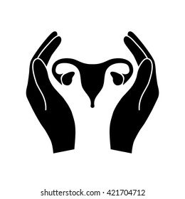 Hands holding Female uterus - protection symbol.