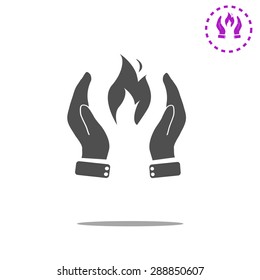 Hands holding fire