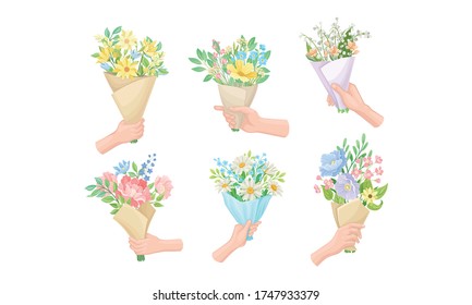 Hands Holding Flower Bouquets Wrapped in Craft Paper Vector Set