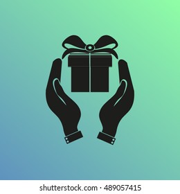 Hands holding a gift.