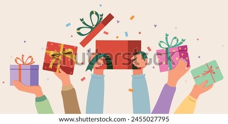 Hands holding gift box, Surprise gift. Birthday celebration greeting design. Open gift box, ribbons and confetti.