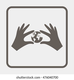Hands holding globe earth.