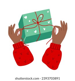 Hands holding a green gift box. Vector illustration on a white background. Concept for gifts, Christmas, New Year, holidays, birthday.