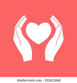 Hands holding heart.