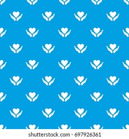 Hands holding heart pattern repeat seamless in blue color for any design. Vector geometric illustration