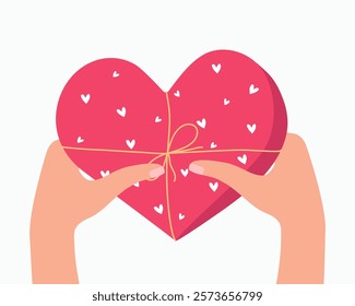 Hands holding a heart shaped gift. Festive gift wrapping. Heart on the palm. Valentine's Day, wedding, birthday. I love you. Isolated background.