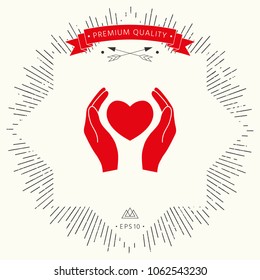 Hands holding heart symbol