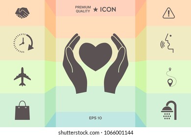 Hands holding heart symbol