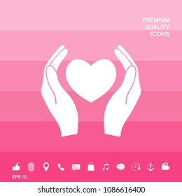 Hands holding heart symbol