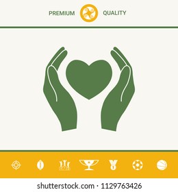Hands holding heart symbol