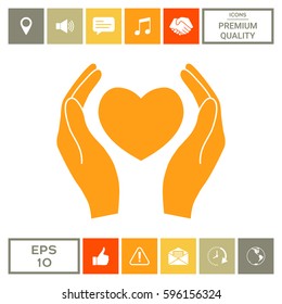 Hands holding heart symbol