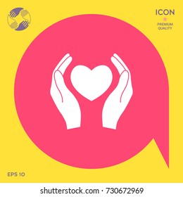 Hands holding heart symbol