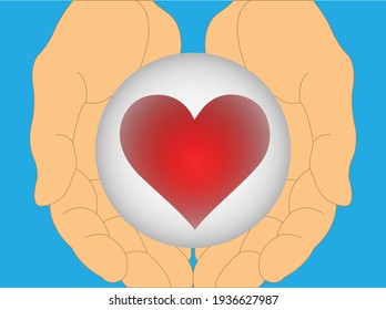 Hands holding a heart in a transparent globe