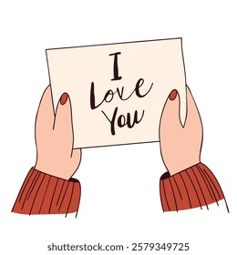 Hands holding a heartfelt I Love You card. For Valentine's Day, romantic greetings, love letters, and romantic messages.