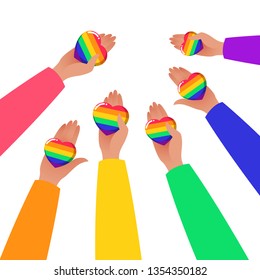 Hands Holding Hearts. LGBTQ+ related symbol in rainbow colors. Gay Pride. Raibow Community Pride Month. Love, Freedom, Support, Peace Symbol. Flat Vector Design Isolated on White Background