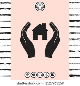 Hands holding home