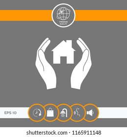 Hands holding home
