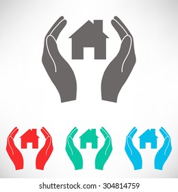 Hands holding home.