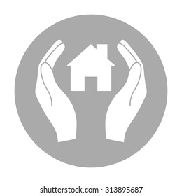 Hands holding home