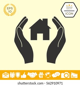 Hands holding home