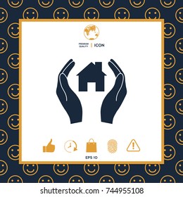 Hands holding home