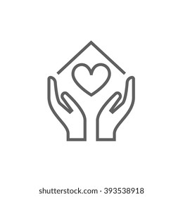 Hands holding house symbol with heart shape line icon.