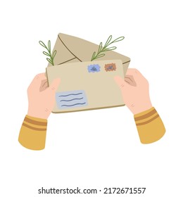 Hands holding letter. Envelope with greeting. Cute illustration of postcrossing. Handmade paper.