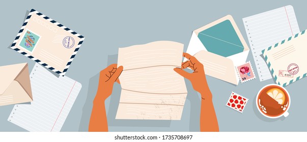 Hands Holding Letter. Envelopes, Post Stamps And Post Cards On The Table. Top-down View.  Modern Vector Illustrated Banner, Card Design. Correspondence And Postal Delivery Concept.