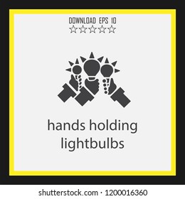 hands holding lightbulbs   vector icon