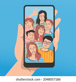 Hands holding mobile phone with happy friens on screen. Young people posing for selfie