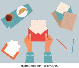 Hands holding an opened envelope. Envelopes and letter on table. Top down view. Correspondence and mail delivery concept. Illustration for web design and print. Vector illustrated banner, card design.