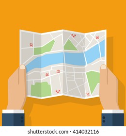 Hands Holding Paper Map. Folded Map In Hands Of Men. Tourist Look At Map Of The City To The River, Is Looking For. Vector Illustration In Flat Design. Travel Concept.