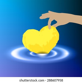 Hands holding paper yellow heart. Waves on dark blue water from falling drop. pick. catch. be drowned