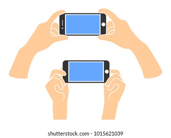 Hands holding phone in horizontal position. Blank screen mobile phone for message or photo.
