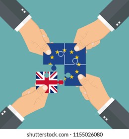 Hands holding puzzle pieces. Three pieces with European flag and one piece with Union Jack. Brexit concept