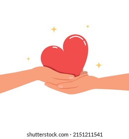 Hands holding red heart, Heart in hand, donation and charity concept.