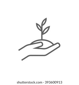 Hands Holding Seedling In Soil Line Icon.