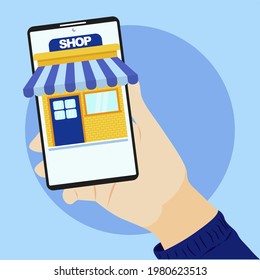 Hands holding smartphone and buying in online store Free Vector