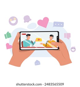 Hands holding a smartphone in landscape mode. The screen shows two men with headphones engaged in a conversation at a desk. Social media elements around the phone

