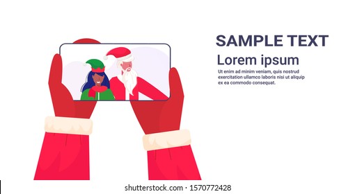 hands holding smartphone santa claus with african american female elf helper on screen christmas holidays celebration concept online mobile app portrait horizontal copy space vector illustration