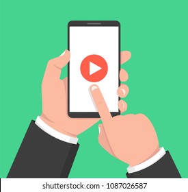 Hands holding smartphone and touching screen. Video player on screen. Vector illustration.