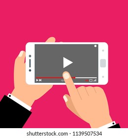 Hands holding smartphone and touching screen. Video player on screen. Vector illustration.
