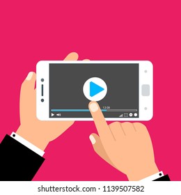 Hands holding smartphone and touching screen. Video player on screen. Vector illustration.