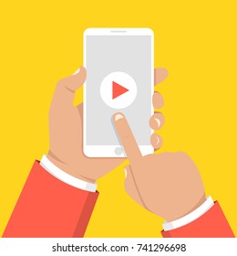 Hands holding smartphone and touching screen. Video player on screen. Vector illustration.