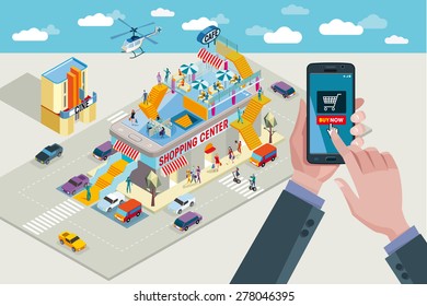 Hands Holding A Smart-phone. In The Touchscreen A Mobile Applications With Buying Icon. In The Background A Shopping Center In Isometric View.